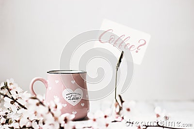 Wild cherry flowers, note holder with `Coffee?` text Stock Photo