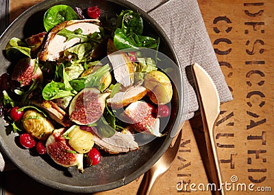 Wild game salad with pheasant, chestnuts and figs Stock Photo