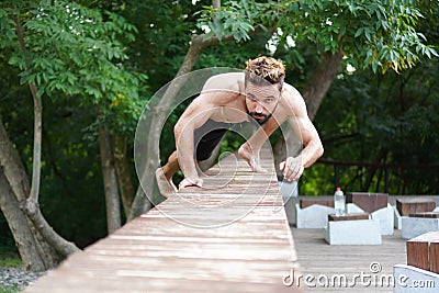 Wild man concept. Athletic man doing yoga training Stock Photo