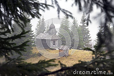 Monastery in the fir forest Stock Photo
