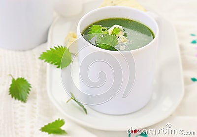 Wild nettle cream soup with blue cheese . Stock Photo