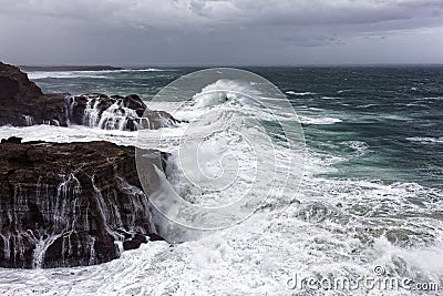 Surging billows at rocky coast Australian landscape Stock Photo