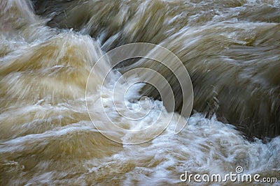 Wild turbid water rapids Stock Photo