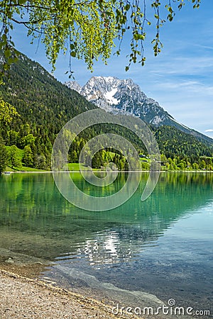 Wilder Kaiser mountain range reflected in idyllic Hintersteiner See, Scheffau, Tyrol, Austria, Europe Stock Photo