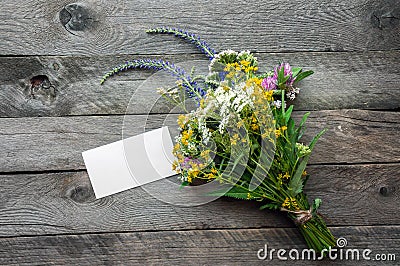 Wildflowers on wooden table Stock Photo