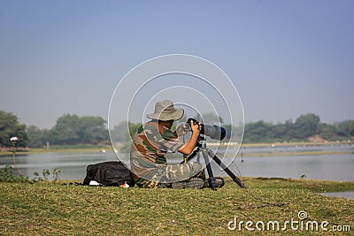 Wildlife Photographer Editorial Stock Photo