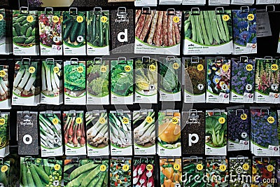 Wilko Branded fruit flower and vegetable seeds in packets on display stand for sale Editorial Stock Photo