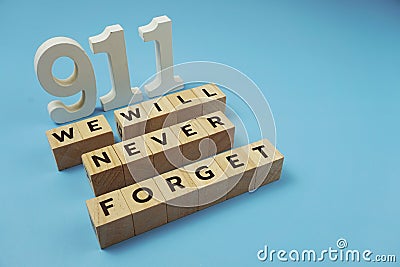 911 We will Never Forget word alphabet letters on blue background Stock Photo