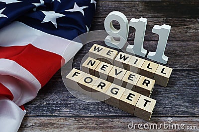 911 We will Never Forget Word alphabet letters on wooden background Stock Photo