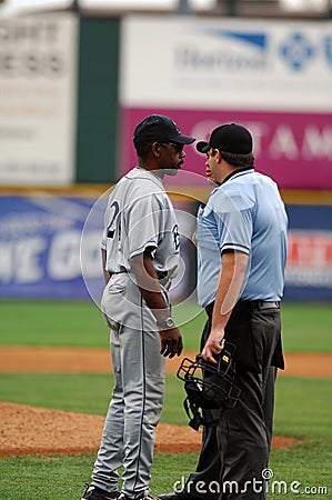 Willie Upshaw argues a call in a baseball game Editorial Stock Photo