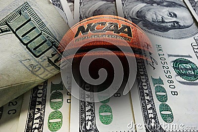 Wilmington,NC - USA - 05-07-2021: Composite image of an NCAA Final Four Edition basketball and money Editorial Stock Photo