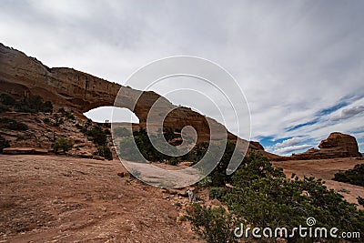 Wilson Arch, located in Dry Valley Utah, is an entrada standstone formation Stock Photo