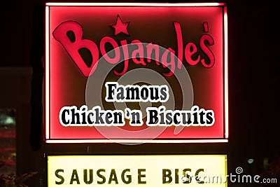 A Bojangles` sign is illuminated at night Editorial Stock Photo