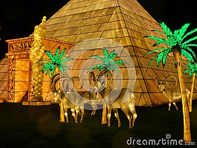 Wiltshire, UK - December 15 2018: The Festival of Light at Longleat depicting a story of 2 young travellers travelling through Editorial Stock Photo
