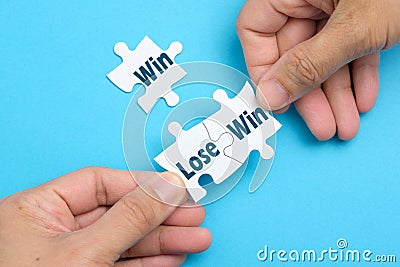 Win lose situation on white puzzle Stock Photo