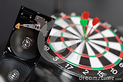 Winchester on background of Darts hit center of target Stock Photo