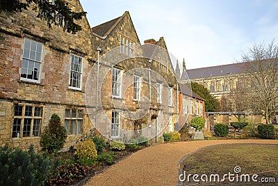 WINCHESTER, UK - FEBRUARY 4, 2017: Winchester Cathedral offices with the Cathedral in the background Editorial Stock Photo