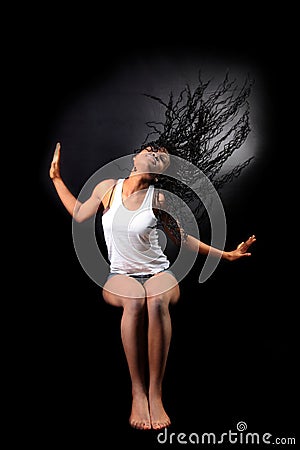 Wind -afro american woman with long flapping hairs Stock Photo