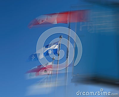 Wind-Blown Flags in Montreal, Canada Stock Photo