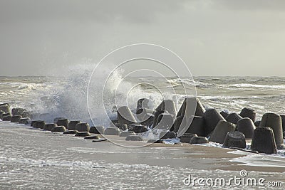 Wind breaker at the coast in Sylt in bad weather, Hoernum Stock Photo