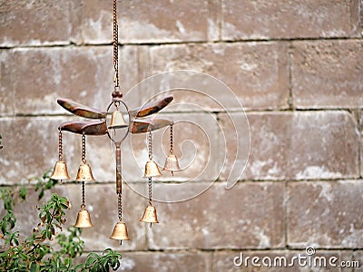 Garden Decor Dragonfly Wind Chime with Golden Bronze Bells Stock Photo