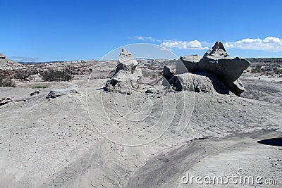 Wind-eroded rock formations of gray sand stone Stock Photo