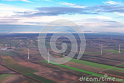 Wind farm and agricultural fields view from above Stock Photo