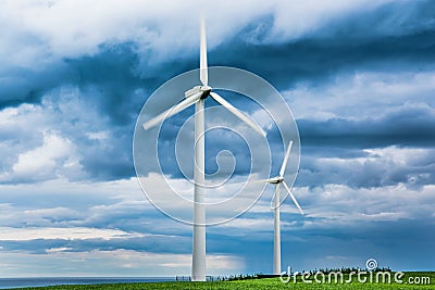 Wind farms in Scotland - wind turbines provide electricity green energy for households in UK Stock Photo