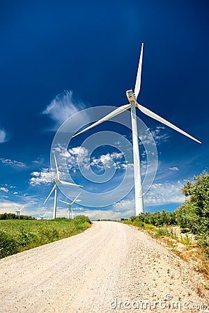 Wind Generator Turbines in Real Landscape - energy concept Stock Photo