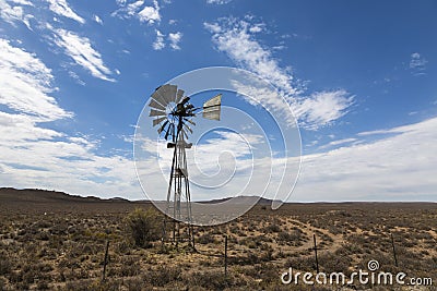 Wind pump in arid Karoo veld Stock Photo