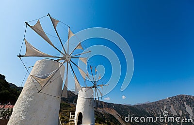 Wind pumps in Island of Crete, Malia Stock Photo