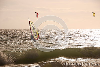 Wind surf and Kite surf at cloudy day in Portugal Stock Photo