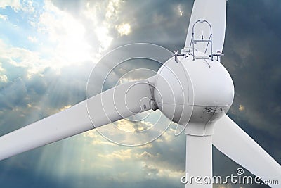 Wind turbine against stormy sky. Stock Photo