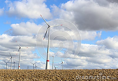 Wind turbine electrical generator infield Stock Photo