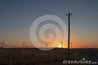 Wind turbine farm in the hot summer wind Stock Photo