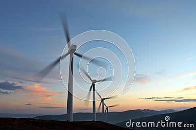 Wind turbine farm turning Stock Photo