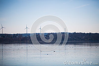 Wind turbine at Starnberger lake Stock Photo