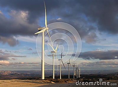 Wind turbines at dusk Stock Photo