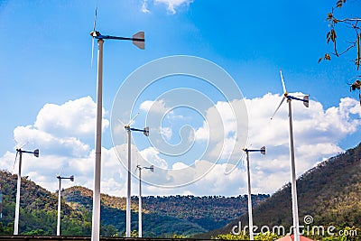 Wind turbines farm eco field in bright day with blue sky background at Chang Hua Man Royal Projects Stock Photo