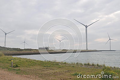 Wind turbines producing alternative energy Stock Photo