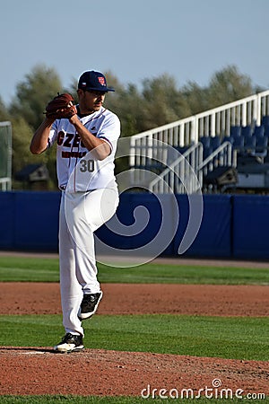 Wind up of Czech pitcher in the Super 6 game against Spain. Editorial Stock Photo