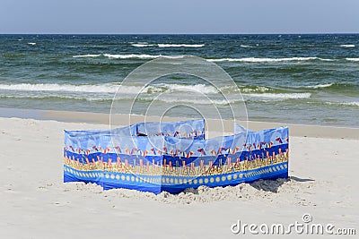 Windbreak on a wide golden beach at the Polish seaside Stock Photo