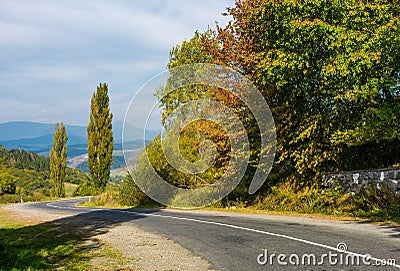 Winding countryside road through mountains Stock Photo