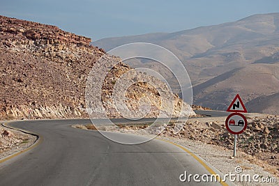 Roadsigns on desert road, Jordan Stock Photo