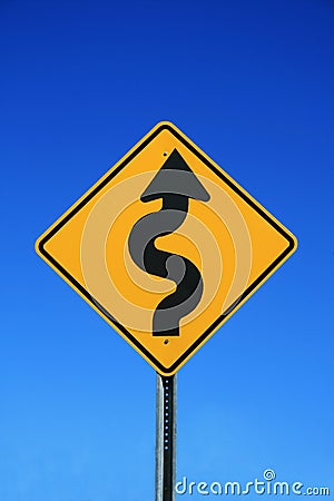 Winding road sign Stock Photo