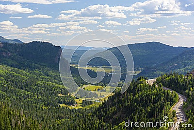 Winding Road Wolf Creek Pass Highway 160 in Colorado on a Sunny Day Stock Photo