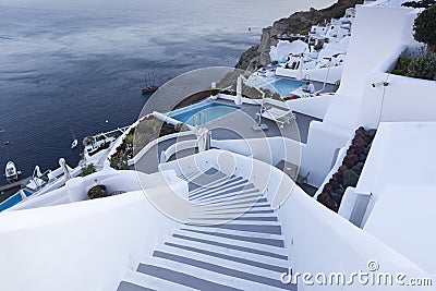 Winding stairs going down to Aegan Sea, Santorini Island -Greece Stock Photo