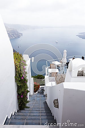 Winding stairs going down to Aegan Sea, Santorini Island, Greece Stock Photo