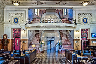 Winding stairs leading up to a balcony in an art deco hotel lobb Editorial Stock Photo