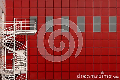 Winding stairs on a red background Stock Photo